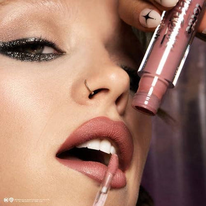 Lottie London Transforming Liquid Lipstick in Wanted, Transforming liquid lipstick with a metallic glitter finish in a nude pink shade - Caffeine Critical