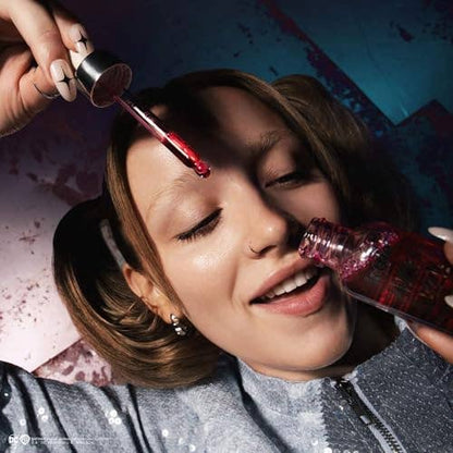 Lottie London x Harley Quinn Crimson Craze Primer, Hydrating crimson serum-primer that grips makeup for long-wear for a dewy glow finish - Caffeine Critical